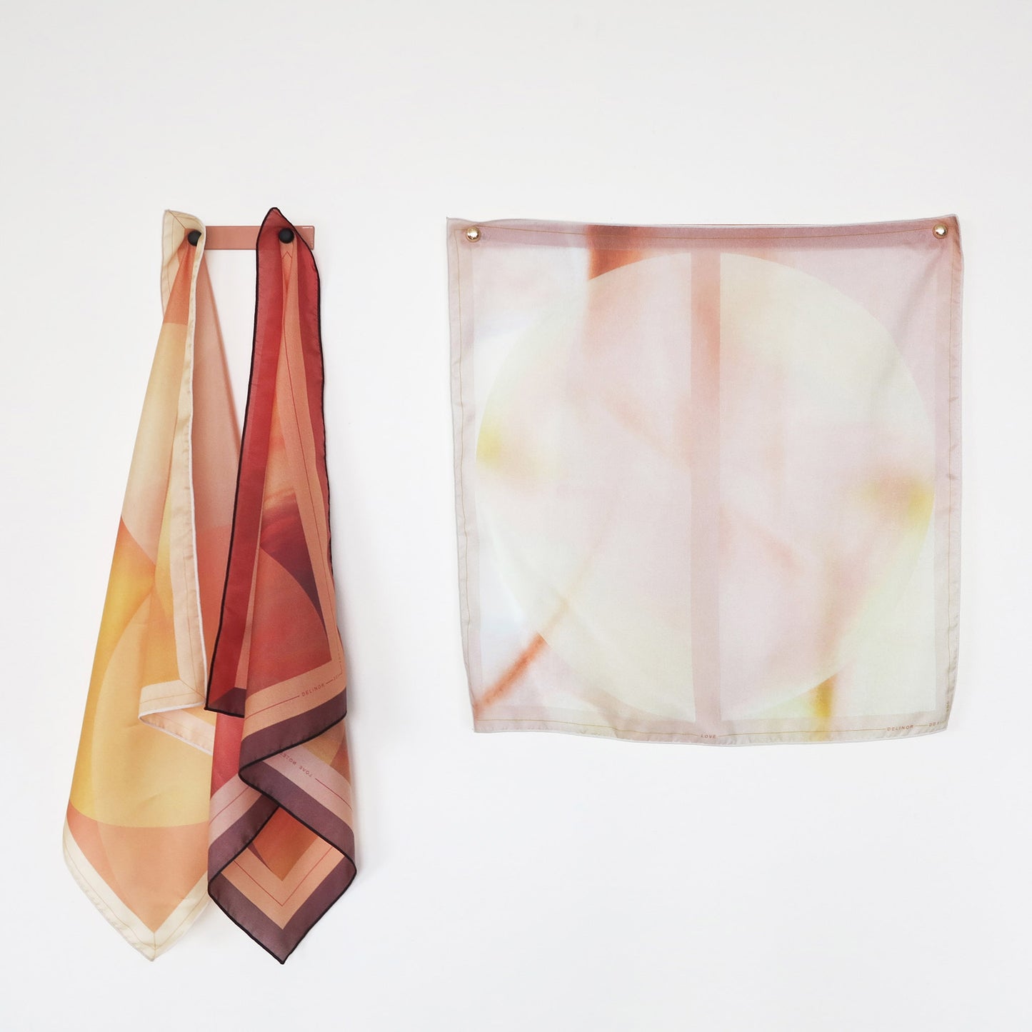Delinor porte carre rose 15in Linea pink metal hanger for mural art showing Blush silk scarf 16in