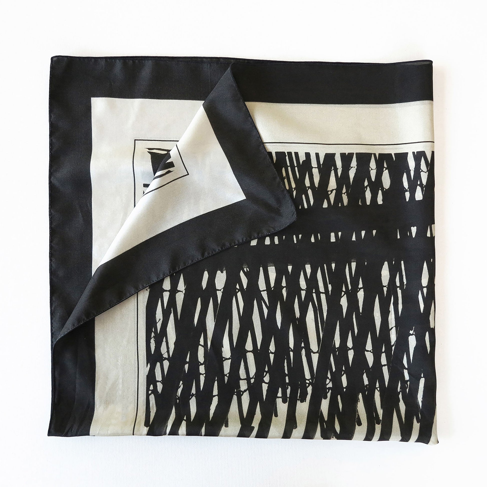 Delinor carre soie Mana noir 35in 90cm luxury black beige taupe silk scarf folded plie