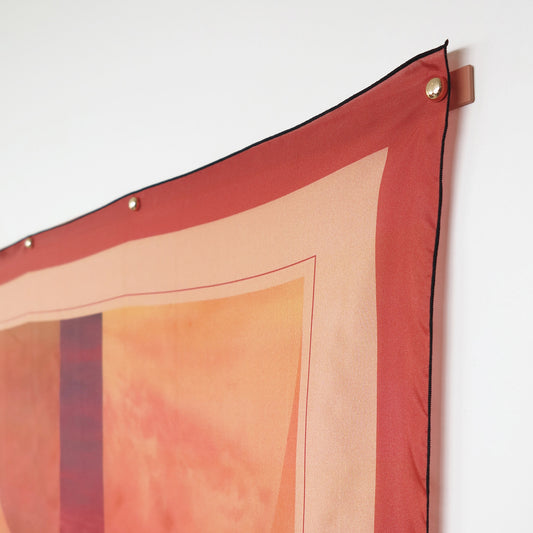 Delinor porte carre rose 35in Linea pink metal hanger for mural art showing Lautitia silk scarf